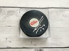 Gustav Nyquist Signed Detroit Red Wings Hockey Puck Autographed NHL b