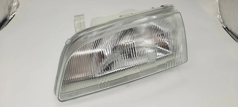 Faro Suzuki Swift Cultus 1989-1995 LH X1 Foto 2 de 4