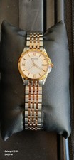 Bulova Two-Tone Stainless Steel Analog Wristwatch Date Indicator Roman Numerals