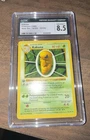 Pokemon TCG 1999 Kakuna 033/102 Base Set Shadowless Regular 1st Edition CGC 8.5
