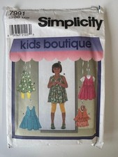 Uncut Simplicity 7991 sewing pattern Girls Dresses