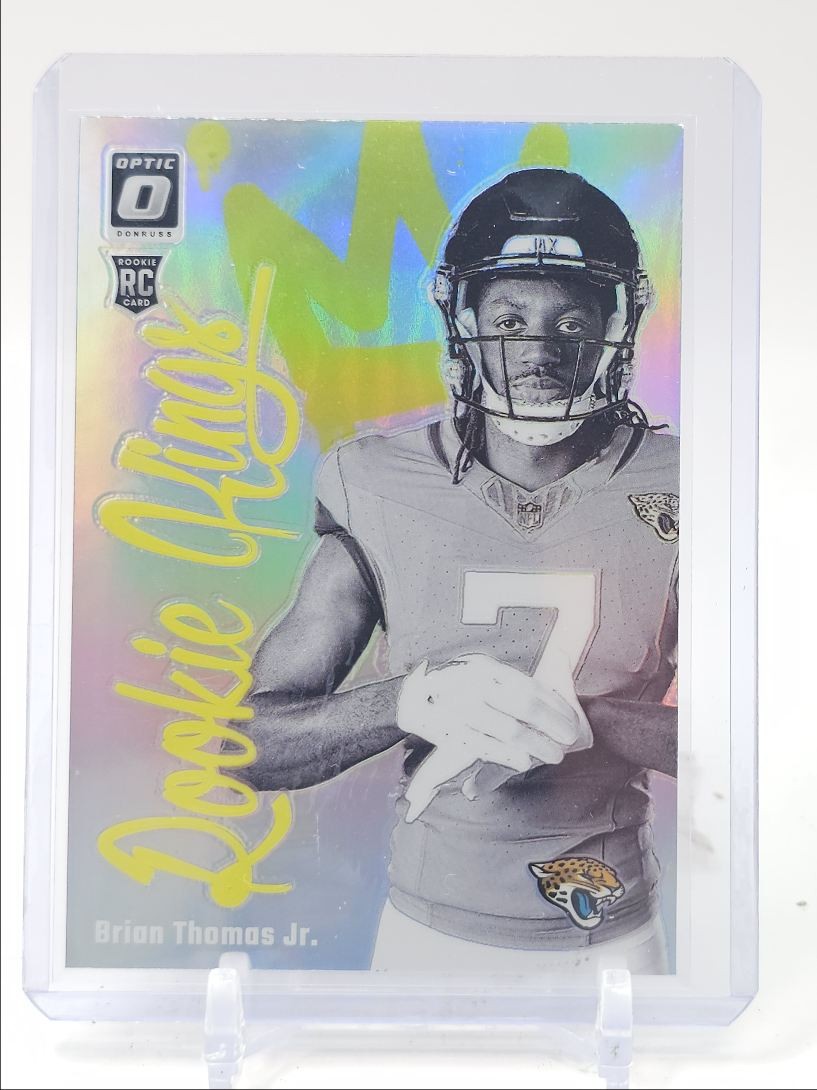 BRIAN THOMAS JR. 2024 DONRUSS OPTIC ROOKIE KINGS PRIZM CASE HIT SP RC Q4556
