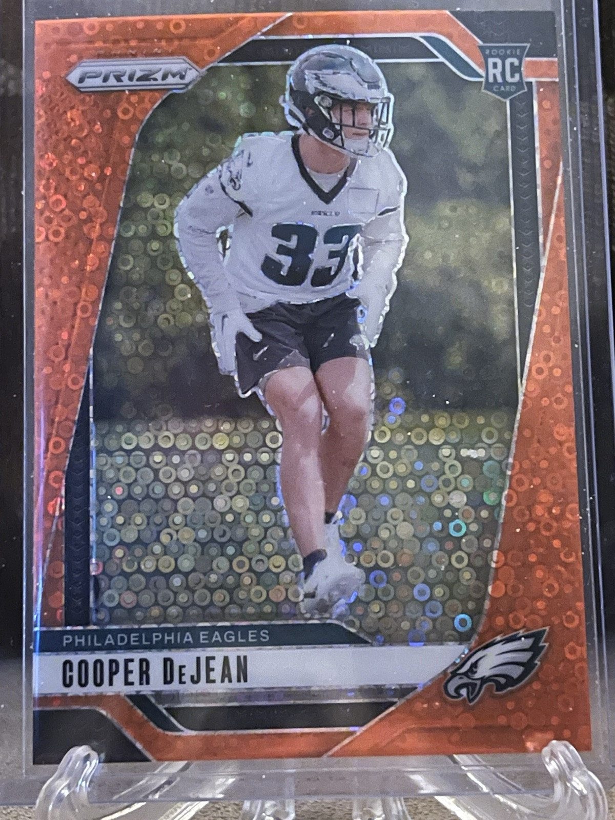 2024 Panini Prizm Football - Rookies Orange Disco Prizm #321 Cooper DeJean (RC)