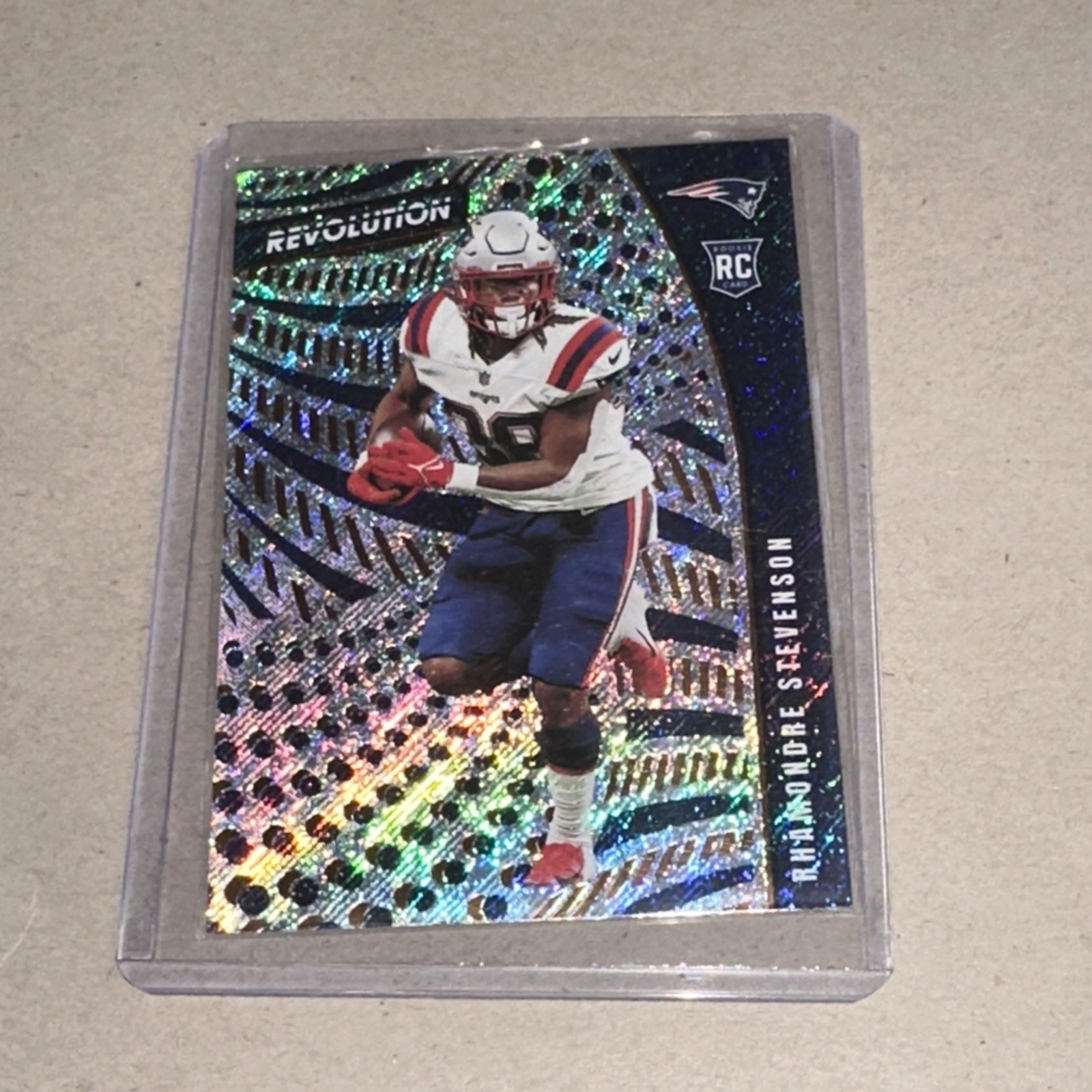 2021 Panini Chronicles - Revolution Rhamondre Stevenson #REV-11 (RC)