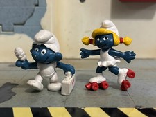 2 Schleich Peyo Smurfs Roller Skating Smurfette  First Aid Smurf Vtg PVC Figure