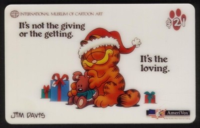 $21. Garfield The Cat Playing With Toys At Christmas: It's The Loving Phone Card