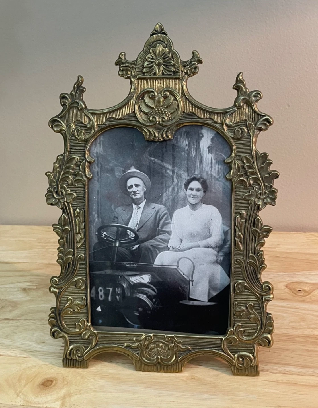 Vintage ornate brass picture frame for a cowgirl coastal living room