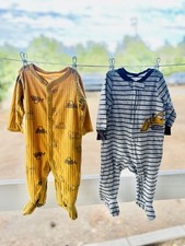 Two Sets of Carters Construction Pajamas Size 6 Months Zipper And Buttons