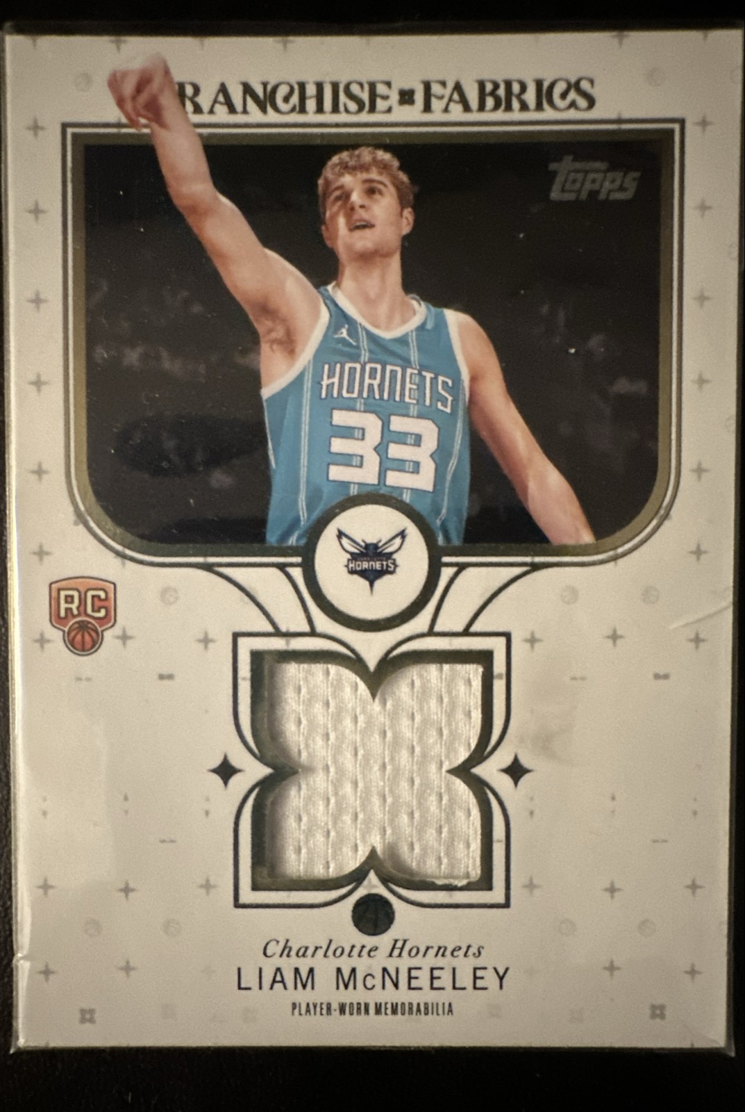 2025-26 Topps - Franchise Fabrics Liam McNeeley #FF-LM (MEM, RC)