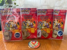 Pokémon Collectible Dog Tags - Lot of 4 Sealed Packs + E3 Rare Ho-Oh Coin