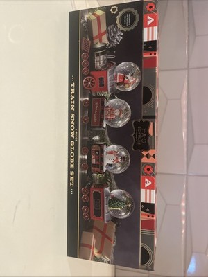 F.A.O SCHWARZ 4- piece Train Snow Globe Set