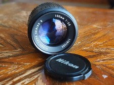 Nikon 100mm f/2.8 Series E AIS Manual Focus Camera Lens used, with caps