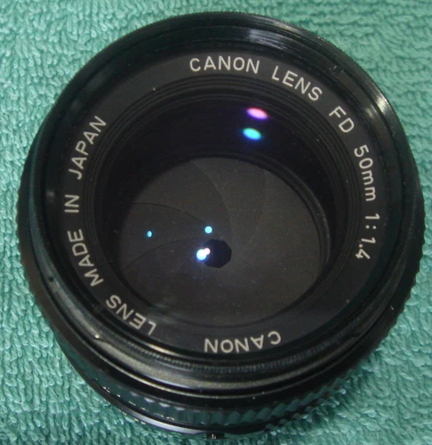 Canon FD 50mm F1.4 Normal Lens. Very Nice Shape. Front and Rear Caps.