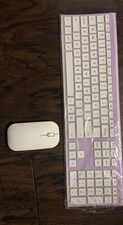 Purple And White Wireless Keyboard And Mouse