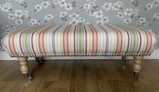 A new footstool in Laura Ashley seaside stripe fabric