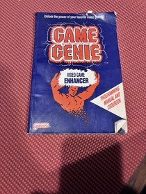 NES Game Genie and Book