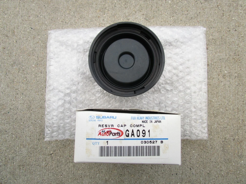 90-94 SUBARU LOYALE CILINDRO MAESTRO DEPÓSITO LÍQUIDO DE FRENOS TAPA OEM NUEVO Foto 2 de 4