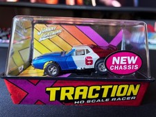 JOHNNY LIGHTNING 1AMC JAVELIN TRACTION SLOT CAR IN RED/WHITE/BLUE NIB HO SCALE