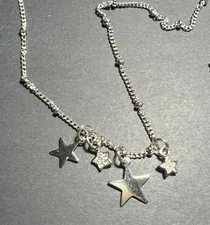 KIRKS FOLLY SILVER TONED STARS NECKLACE W/RHINESTONES, 16 INCH, SIGNED