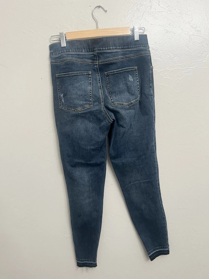 Pantalones de mezclilla ajustados Spanx desgastados al tobillo dobladillo crudo lavado pequeño desgastado Foto 3 de 4