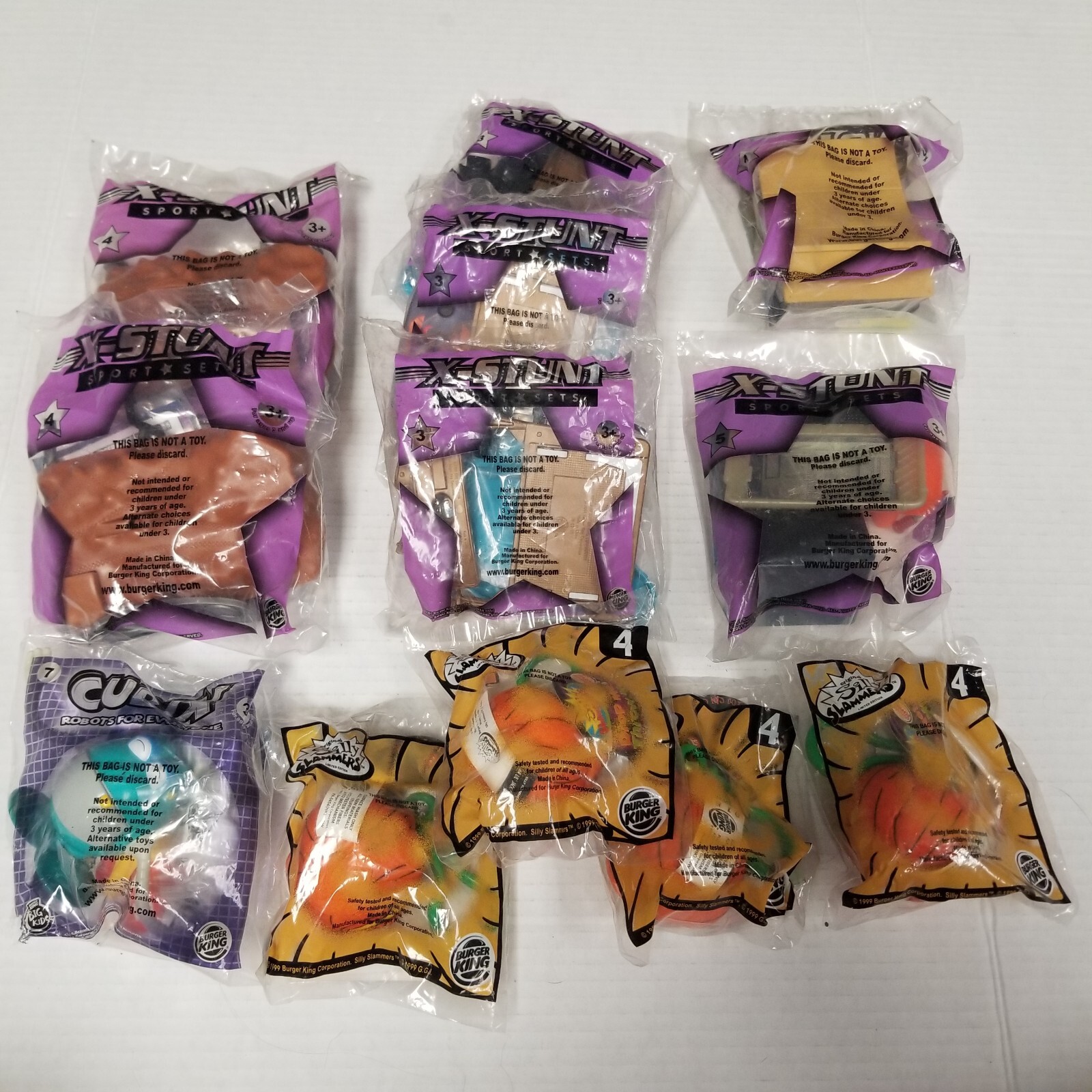 Vintage 2000 Burger King X-Stunt Cubix Silly Slammers Toy Lot Sealed