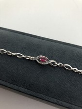 Beaverbrooks Sterling Silver Red Ruby White Diamond Twist Tennis Bracelet 7.5”