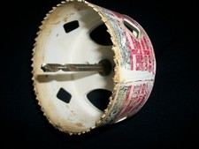 4" BLU-MOL BI-METAL HOLE SAW WITH ARBOR 3/16" THICK BACKING PLATE USED 1 TIME