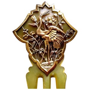 Late Victorian hair comb with applied Japonism bird motif
