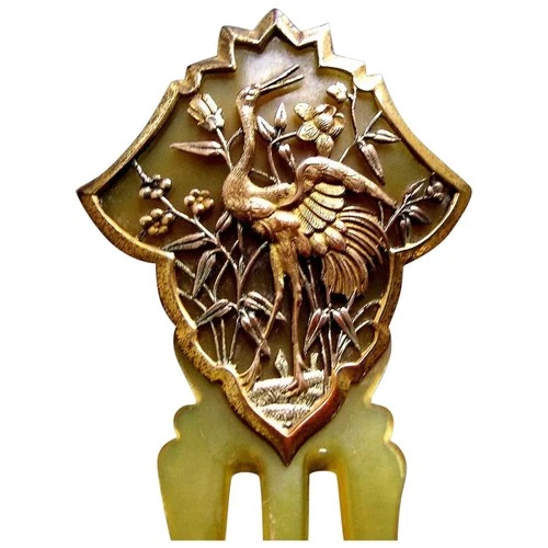 Late Victorian hair comb with applied Japonism bird motif