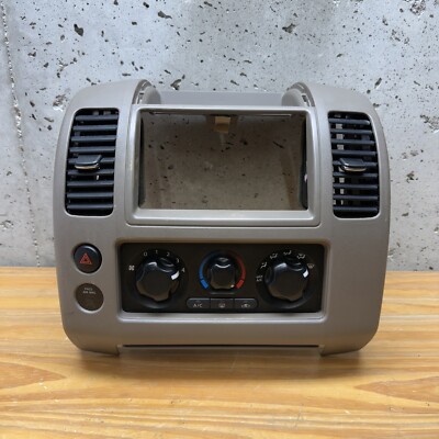 2005-12 NISSAN XTERRA PATHFINDER OEM FRONT AC CLIMATE SWITCH CONTROL RADIO BEZEL
