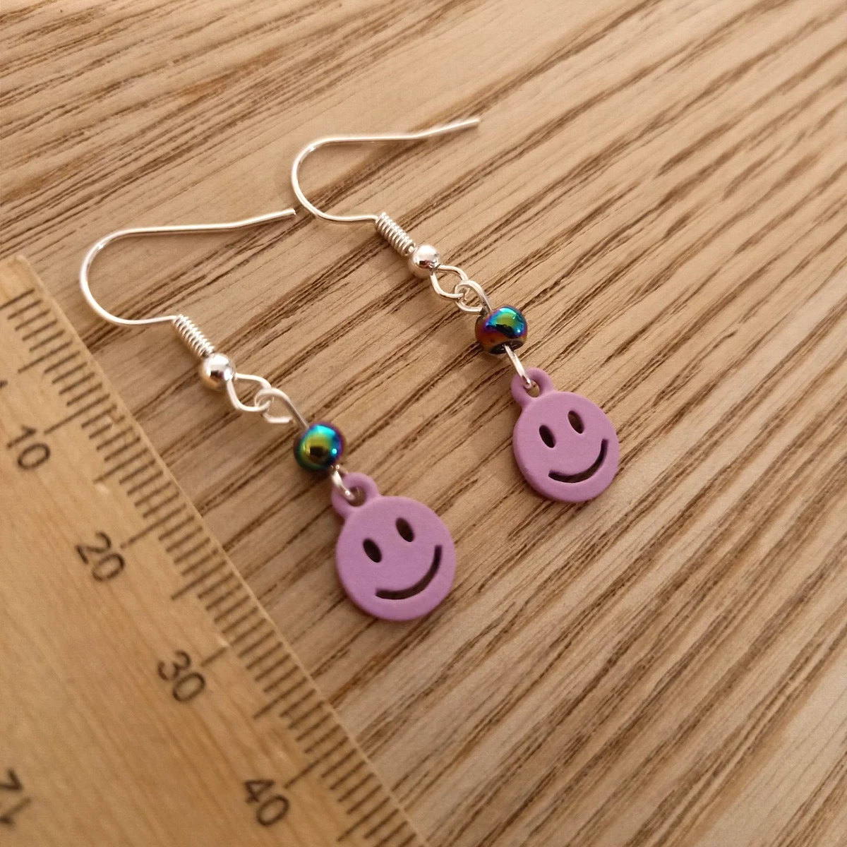 Smiley face dangle earrings deals