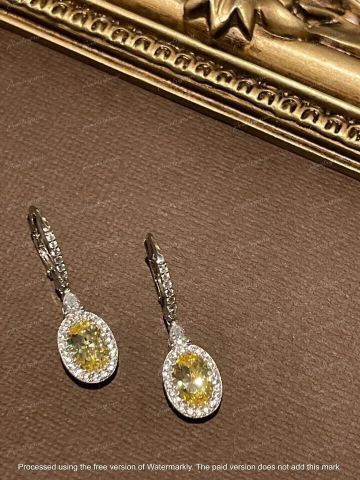 Pendientes colgantes de diamantes canarios de corte ovalado de 4,00 quilates con acabado en oro blanco de 14 quilates Foto 4 de 4