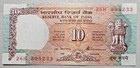 India 10 Rupees 1992 Sign. 86 Unc usual stapleholes