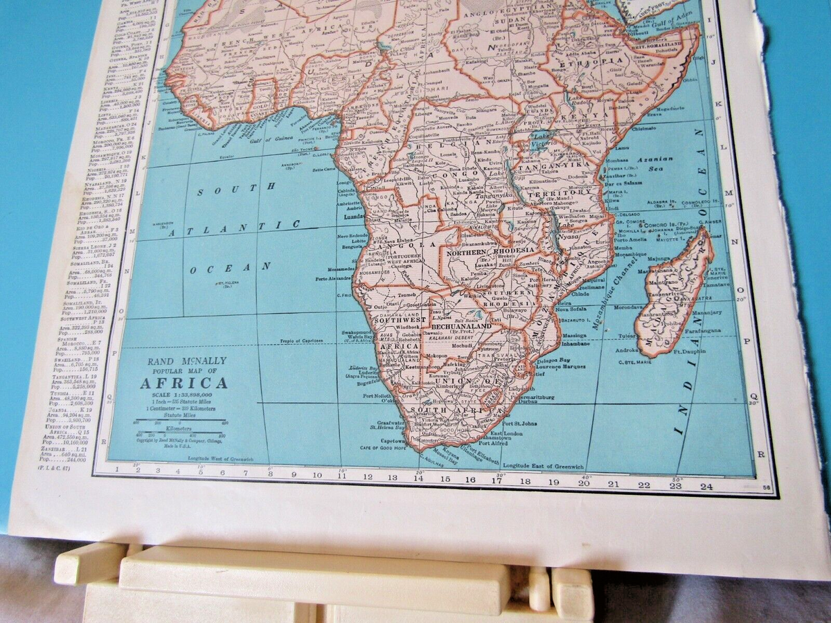 1949 color map of Japan on one side & whole of Africa