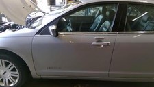 Used Front Left Door Assembly Front Fits 2006 Lincoln Zephyr L. Keyless Entry P Used Front Left Door Assembly Front Fits 2006 Lincoln Zephyr L. Keyless Entry P
