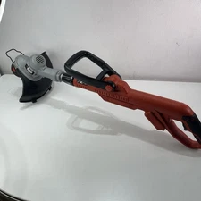 Black & Decker LST300 20V Max 12'' Cordless string Trimmer (tool only) working