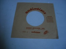 45 COMPANY RECORD SLEEVES. LOT OF ONE, AUDIO-DISCS.