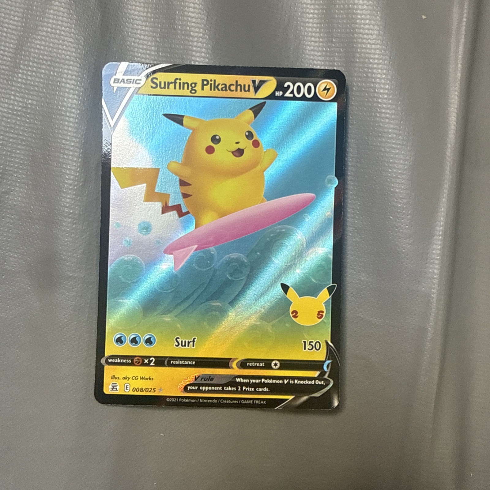 Surfing Pikachu V 008/025 - Celebrations 25th Anniversary Pokemon Card