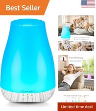 Ultrasonic Aromatherapy Essential Oil Diffuser - Mini Size - 7 Color LED Light