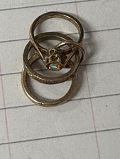 9CT GOLD HALLMARK TRIO OF RINGS CHARM