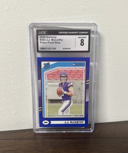 2024 Donruss J.J. McCarthy Press Proof Blue Rated Rookie #303 Vikings CGC 8