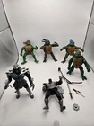 Vintage Ninja Turtles Action Figure Lot of 6 2002 TMNT action figures.