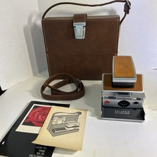 Polaroid SX-70 Instant Camera with Hard Case and Manuals . Excellent Condition.