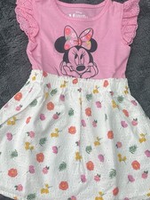 Beautiful Minnie Mouse dress in size 4/5 perfect for girls around 4/5 years old.