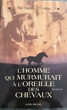 L'HOMME QUI MURMURAIT A L'OREI…