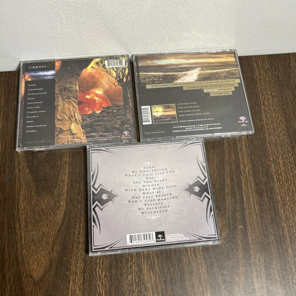 Lot of 3 CDs from Creed Human Clay, Greatest Hits, and Weathered - Image 3 of 3