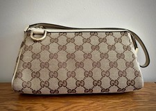 Gucci Abbey D-Ring Pochette (Model 145750) in excellent condition