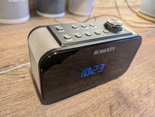 Roberts DAB/DAB+/FM alarm clock radio any-button snooze and smartphone charging