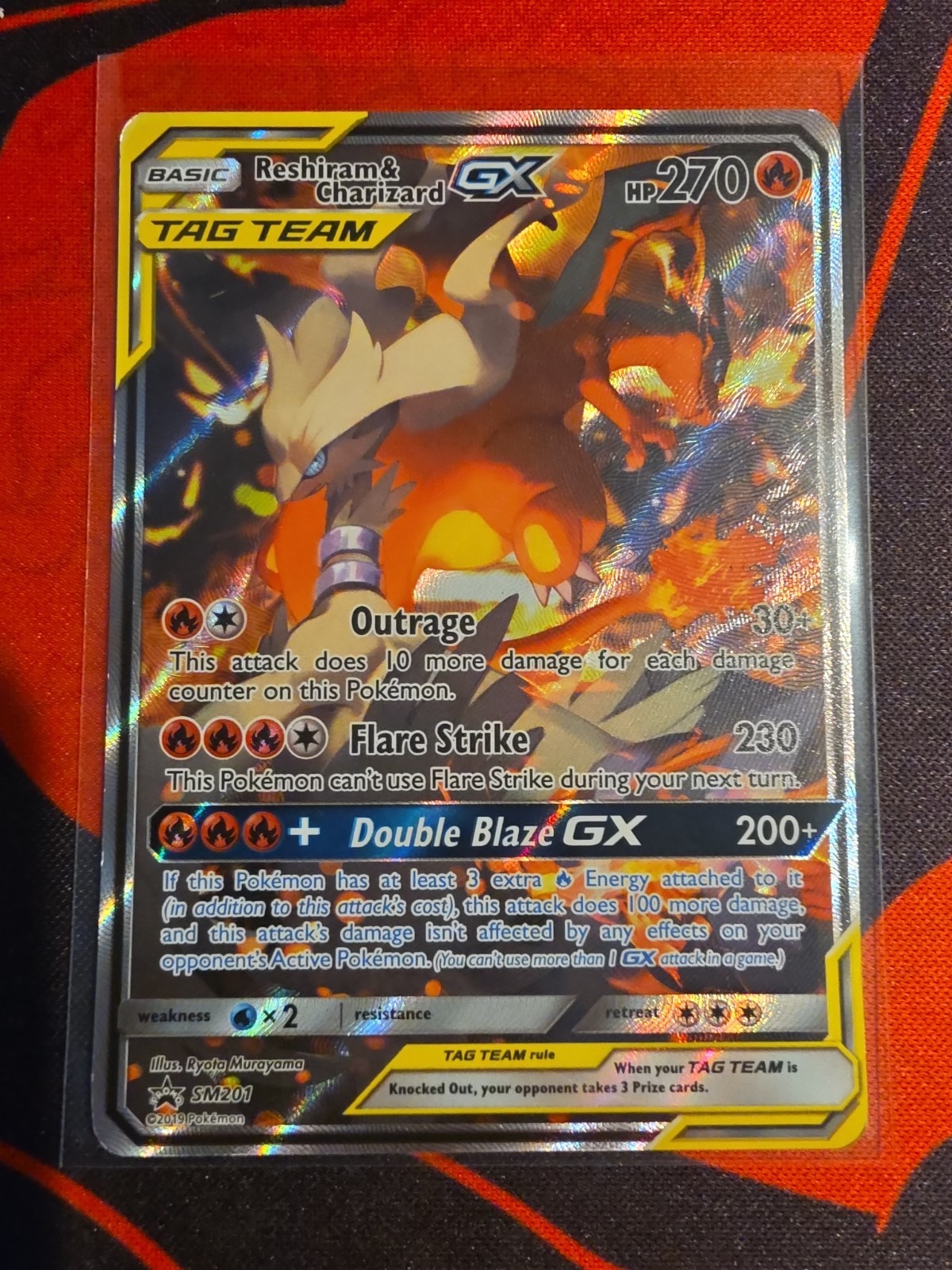 2019 NM Reshiram & Charizard GX SM201 Sun & Moon Black Star Promo