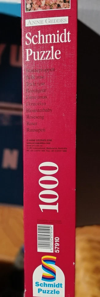 Schmidt Puzzle 1000 pezzi di Anne Geddes - Bambina tra le rose - Immagine 4 di 4